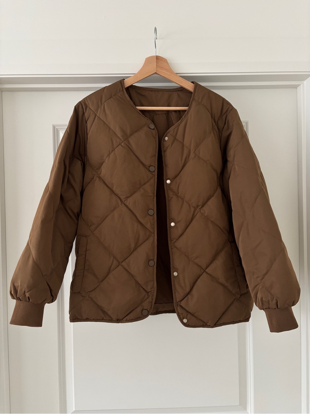 Quilted brown jacket with ring white duck down